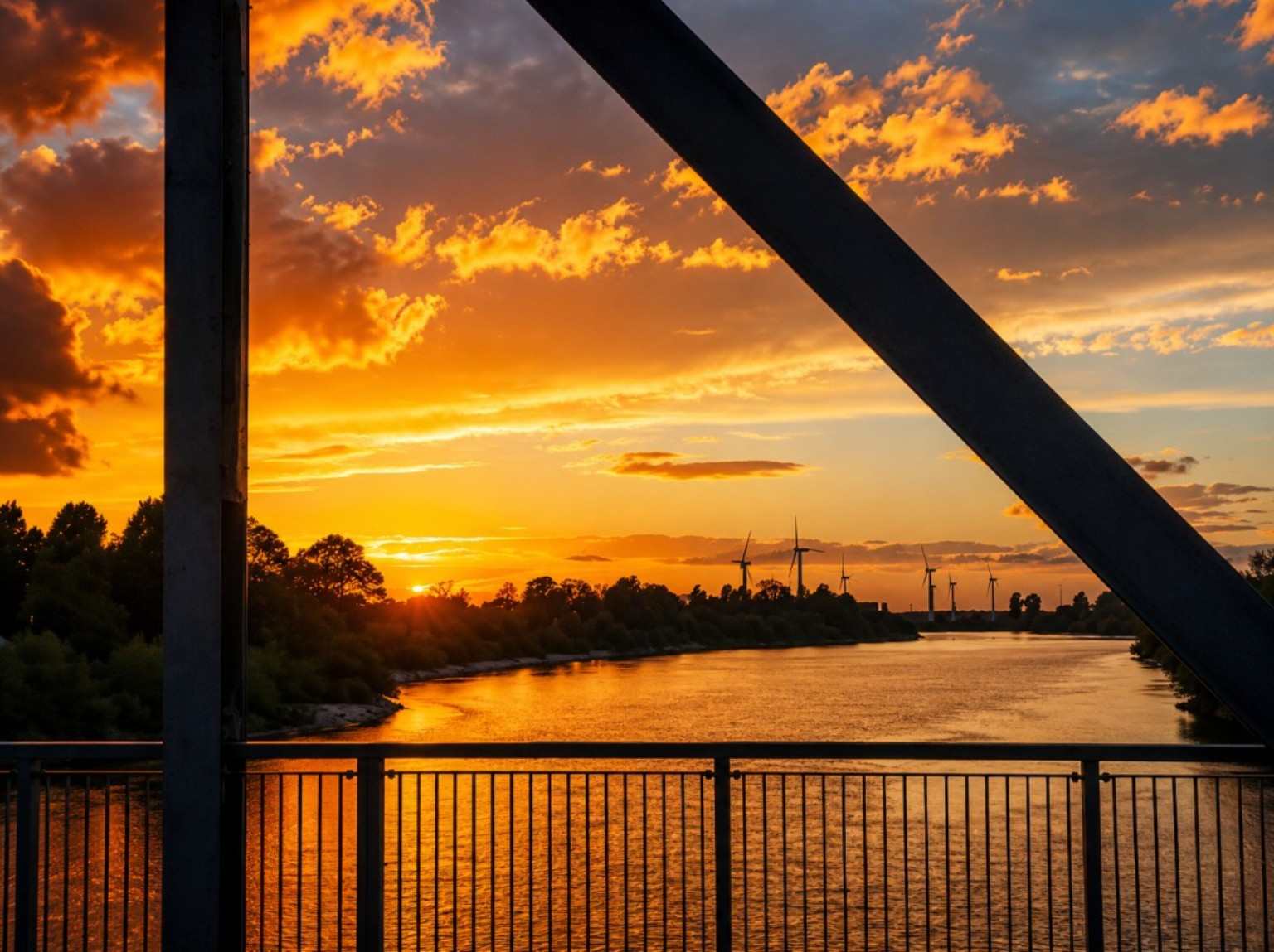 Golden sunset viewed through a bridge